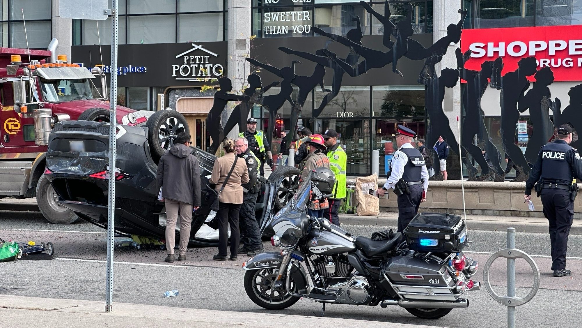 Police investigating after shots were fired from one vehicle at another, causing a crash and rollover in the area of Yonge Street and Empress Avenue in North York on Oct. 7, 2024