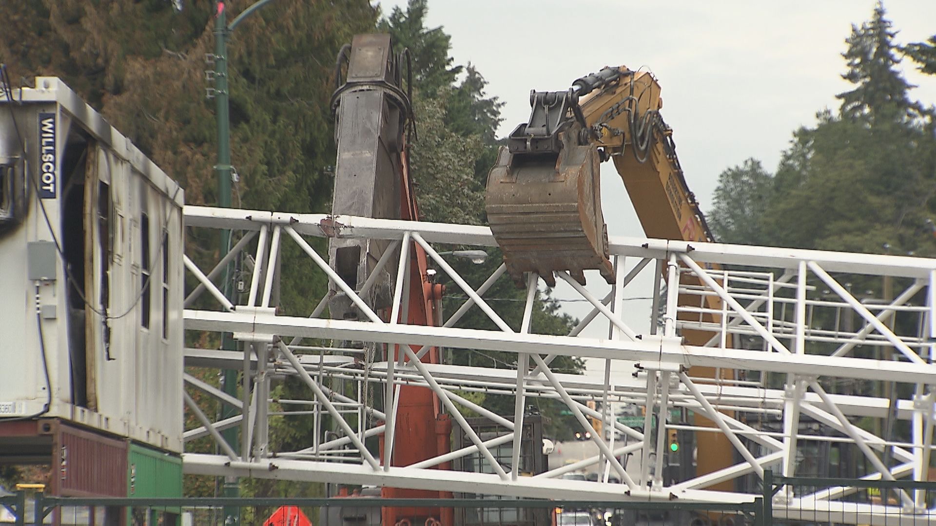 A collapsed crane is seen across W 41st Avenue in Vancouver