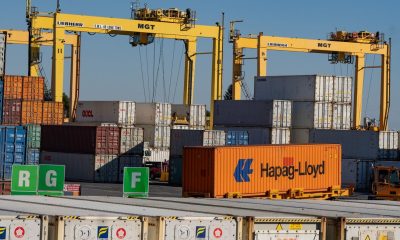 Shipping containers are moved in the Port of Montreal