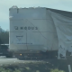 A damaged truck sits idle on Highway 1