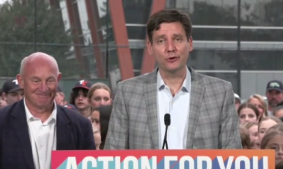 David Eby speaks at a podium