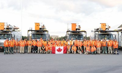 This Oct. 9 handout photo shows Hydro One line workers near the Niagara Falls, Ont., border crossing before heading to Florida to help rebuild power grids after Hurricane Helene and now Milton left millions of Americans in the dark