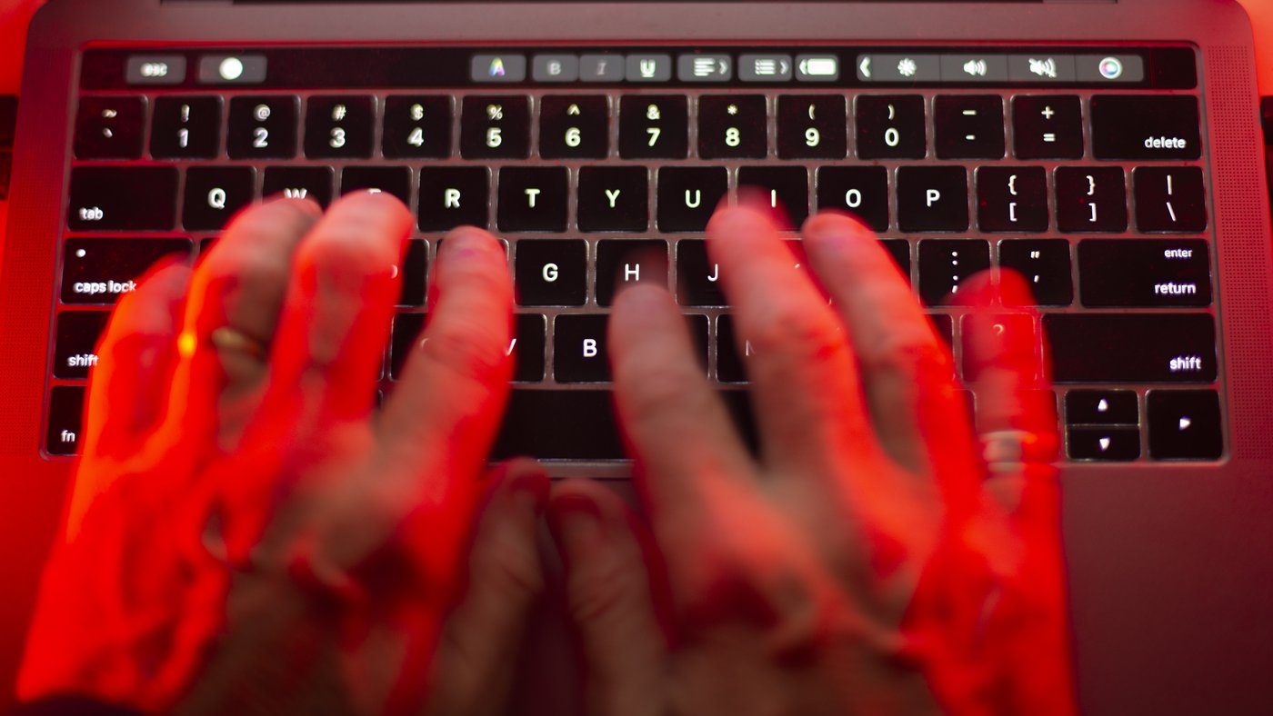 A person using a computer keyboard