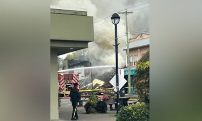 Fire crews continue to battle a raging fire at a restaurant in downtown Langley City.