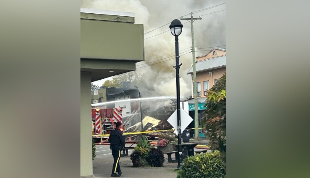 Fire crews continue to battle a raging fire at a restaurant in downtown Langley City.