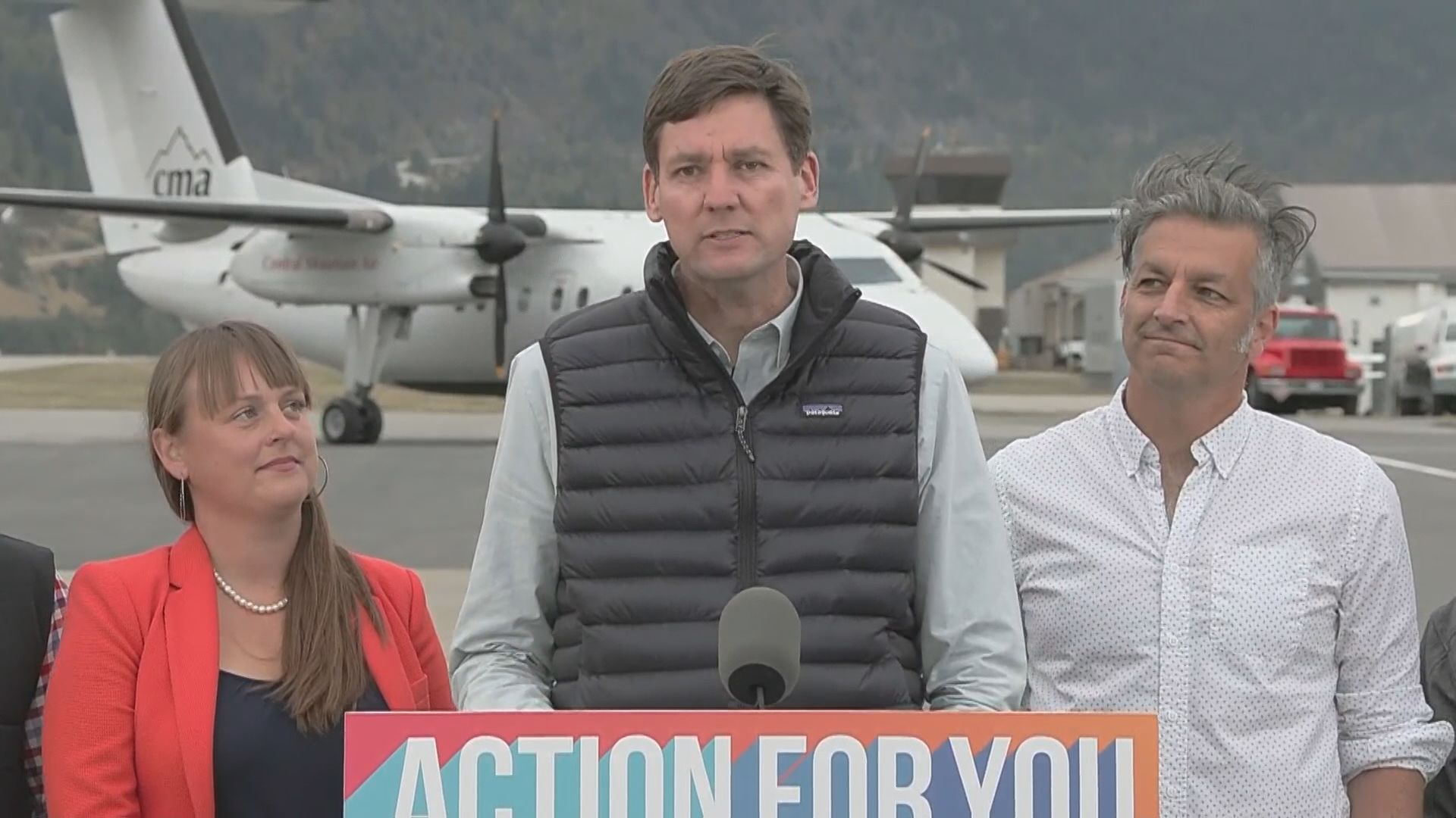 David Eby speaks at a podium