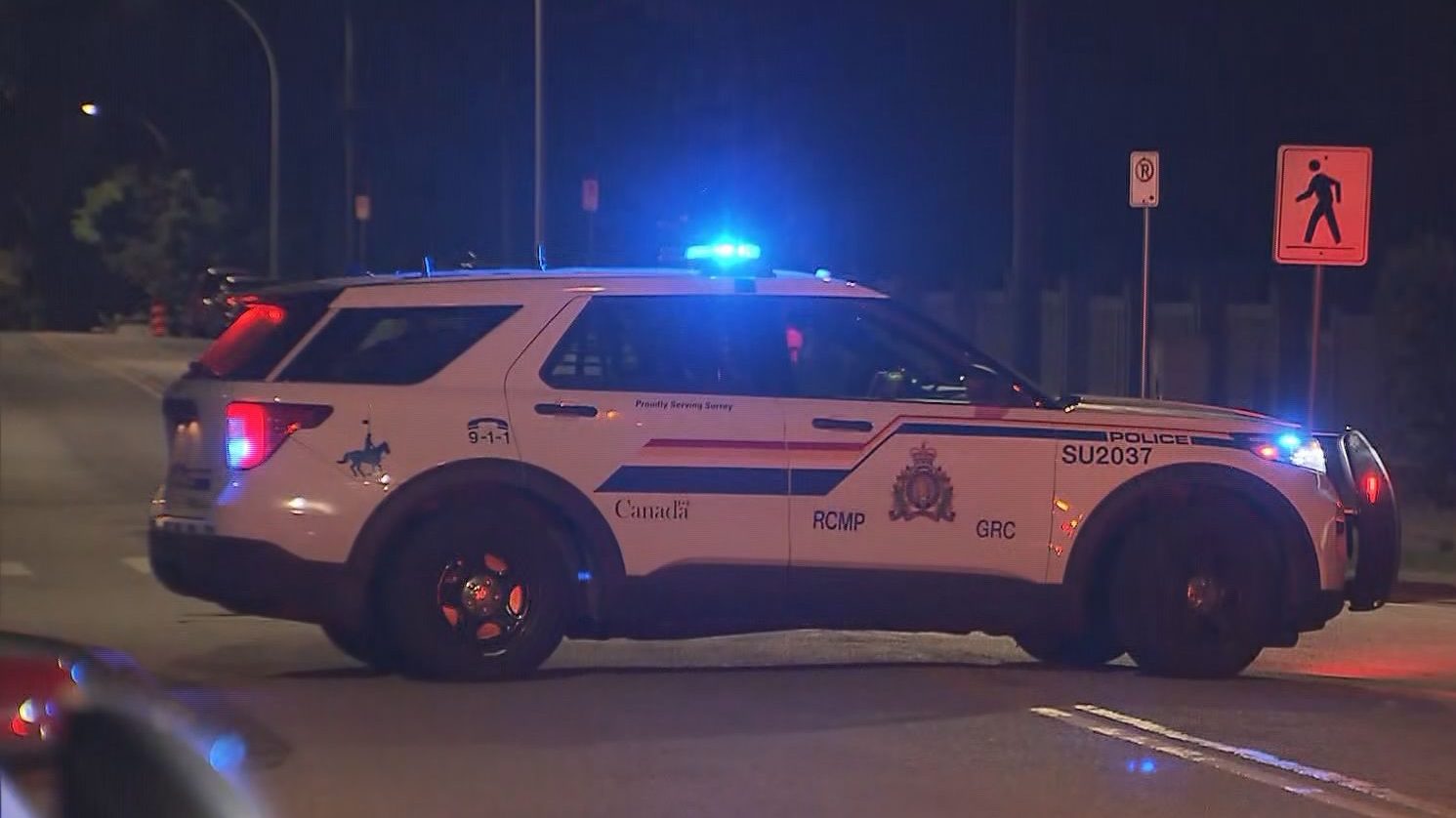 A Surrey RCMP cruiser flashing its lights