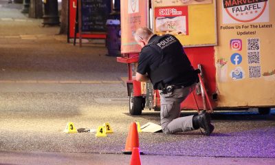 Police say they received multiple 911 calls Oct. 11, 2024, with callers reporting people had been stabbed on Columbia Street outside the SkyTrain station.