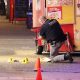 Police say they received multiple 911 calls Oct. 11, 2024, with callers reporting people had been stabbed on Columbia Street outside the SkyTrain station.