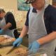 UGM volunteers were busy carving up turkeys early Saturday morning to feed the 3,000 people expected at this year's Thanksgiving meal.