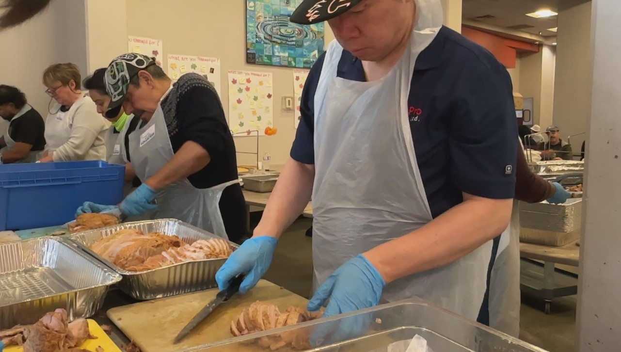 UGM volunteers were busy carving up turkeys early Saturday morning to feed the 3,000 people expected at this year's Thanksgiving meal.