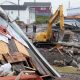 A heavy machinery operator continues the cleanup from the post-tropical storm in Port aux Basques, N.L., Sept.29, 2022