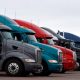 Tractor-trailers parked in a lot