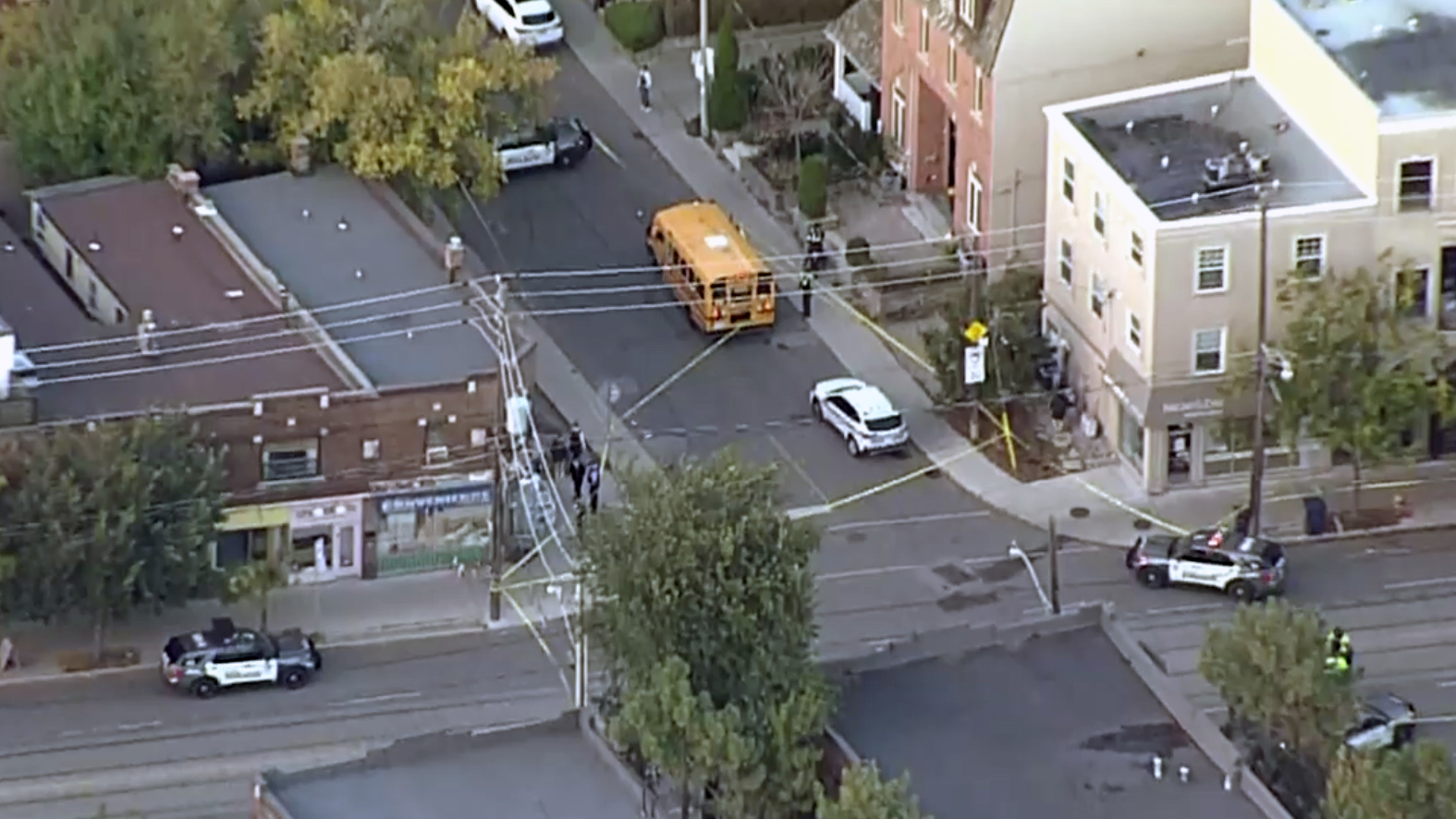 Aerial photo of a crash involving a bus and a pedestrian in the west end