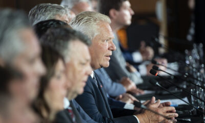 Ontario Premier Doug Ford speaks to reporters as Canada's premiers hold a press conference to close the Council of the Federation meetings in Halifax