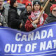 People take part in a protest against NATO in Montreal