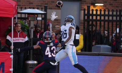 Toronto Argonauts wide receiver Damonte Coxie (86) catches a touchdown as Montreal Alouettes defensive back Lorenzo Burns (43)