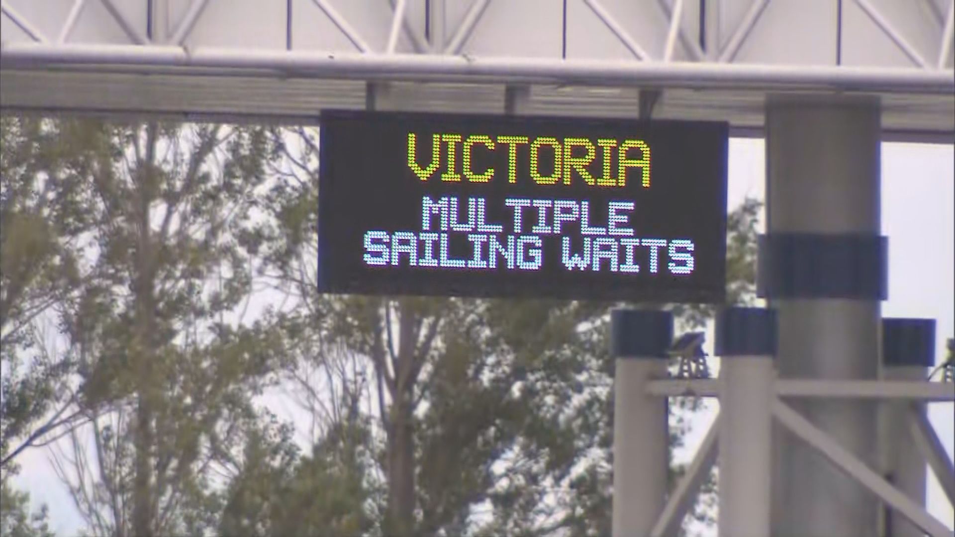 FILE: BC Ferries Tsawwassen terminal sign showing multiple sailing waits.