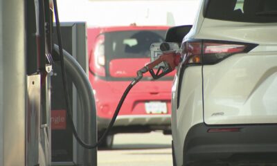 A car at a gas station pump in Metro Vancouver