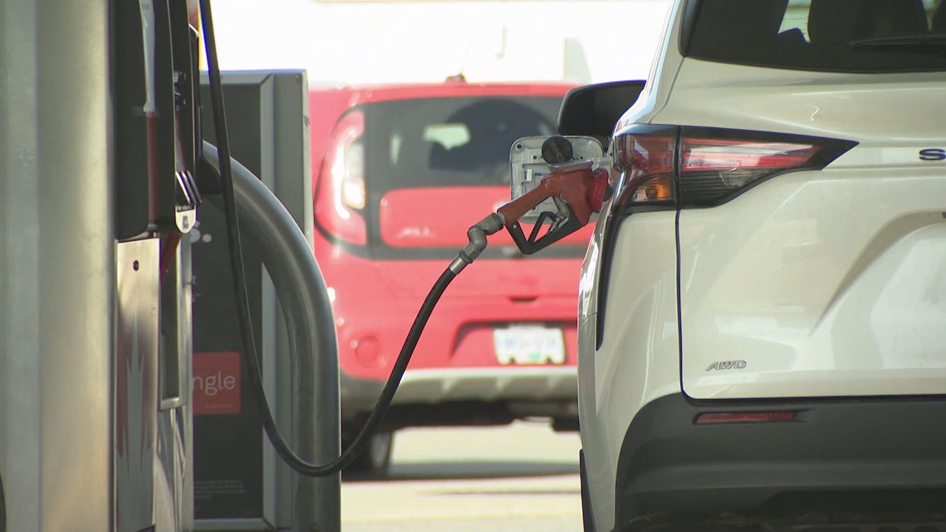 A car at a gas station pump in Metro Vancouver