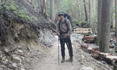 Sam Benastick poses for a photo while hiking