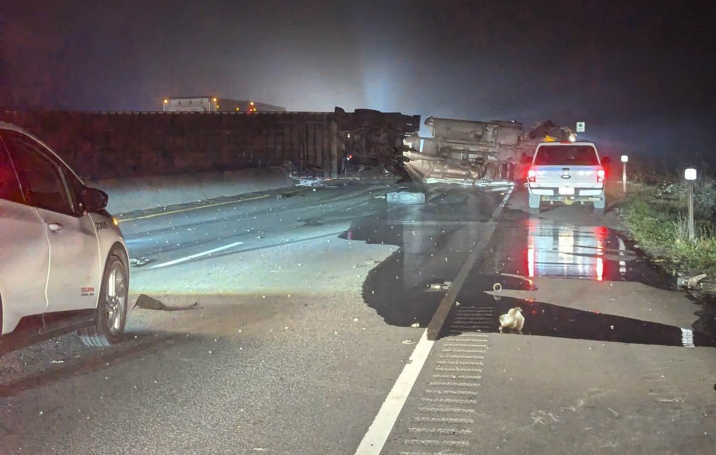 A rolled-over semi truck lies on the road. (Credit Ignacio Aguirre)