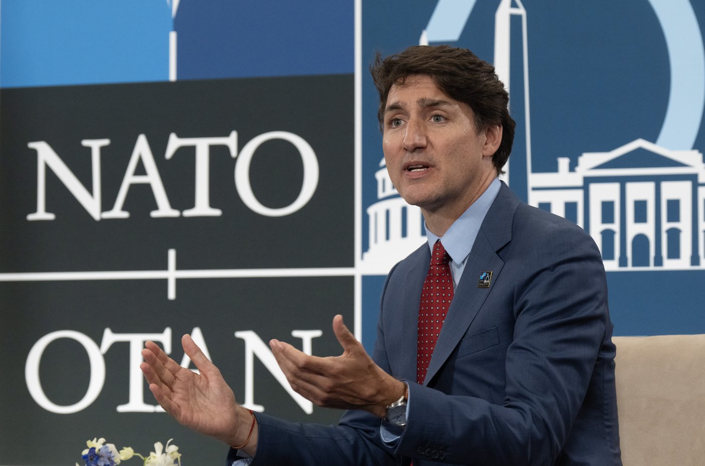 Prime Minister Justin Trudeau delivers remarks before meeting with New Zealand Prime Minister Christopher Luxon at the NATO summit in Washington, on July 10, 2024