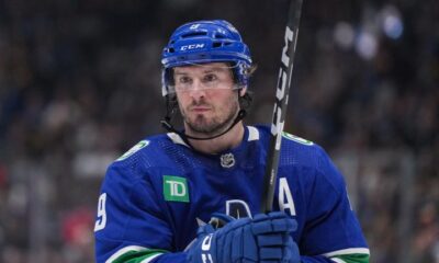 Vancouver Canucks' J.T. Miller prepares to take a faceoff during the second period of an NHL hockey game against the Calgary Flames in Vancouver, on Tuesday, April 16, 2024. (Darryl Dyck/CP)