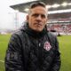 John Herdman stands on the touchline before MLS action in Toronto against Charlotte FC, on Saturday, March 9, 2024.