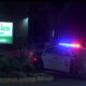 A Hamilton police cruiser is seen outside an apartment building on Main Street West