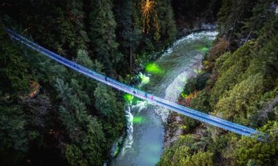 The Capilano Suspension Bridge seen illuminated from above