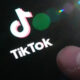 The TikTok startup page is displayed on an iPhone in Ottawa