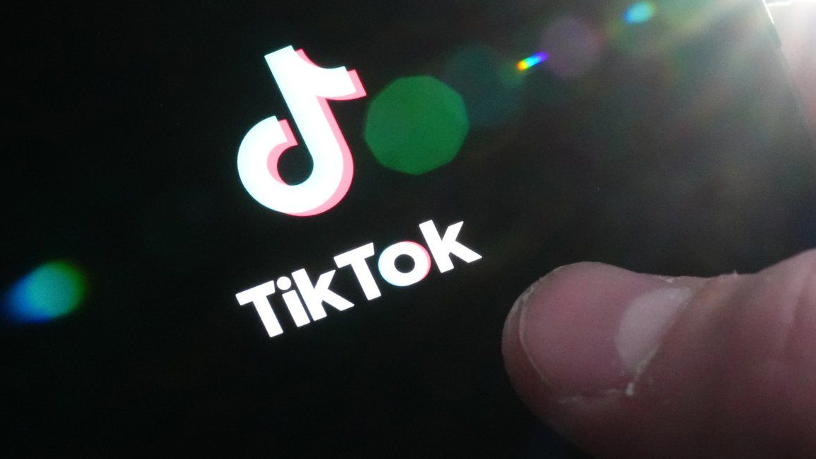 The TikTok startup page is displayed on an iPhone in Ottawa