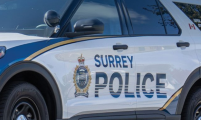 The side of a Surrey Police Service cruiser.