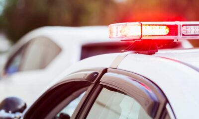 Police lights on the top of a police cruiser.