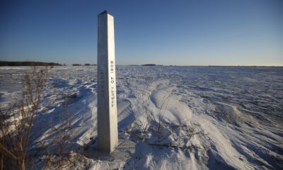 A border marker, between the United States and Canada is shown just outside of Emerson, Manitoba