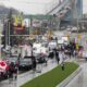 Truckers and supporters block the access leading from the Ambassador Bridge, linking Detroit and Windsor, as truckers and their supporters continue to protest against COVID-19 vaccine mandates and restrictions, in Windsor, Ont., Friday, Feb. 11, 2022.