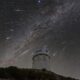 meteors from the Geminid meteor shower streak across the sky above the Nicholas U. Mayall Telescope