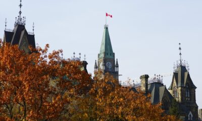 The Canadian flag flies atop the Peace Tower on Parliament Hill in Ottawa on Oct. 30, 2024