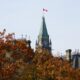 The Canadian flag flies atop the Peace Tower on Parliament Hill in Ottawa on Oct. 30, 2024