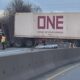 A semi truck blocking lanes of a highway