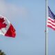 American and Canadian flag at the U.S./Canada border crossing at the Thousand Islands border in Lansdowne, Ont., on Nov. 8, 2021