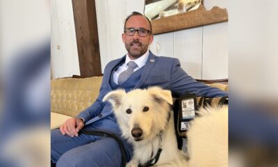 Captain (Ret.) Andrew Gough with his service dog Riggs.