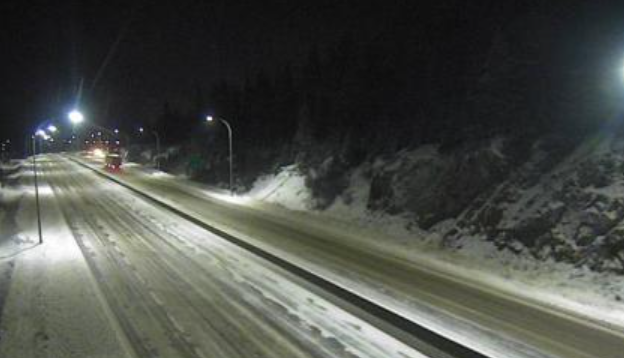 Snow can be seen on the Coquihalla Highway about 61 km south of Merritt just before 7:30 p.m. on Dec. 7, 2024.