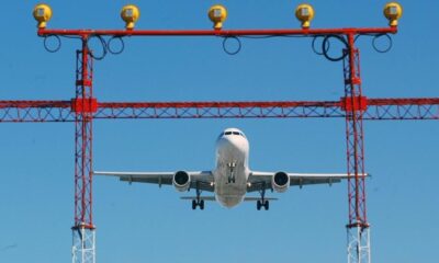 An airplane prepares to land at Pearson International Airport in Toronto