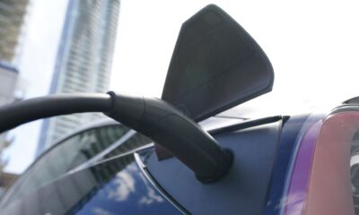 An electric vehicle is charged in Ottawa on July 13, 2022