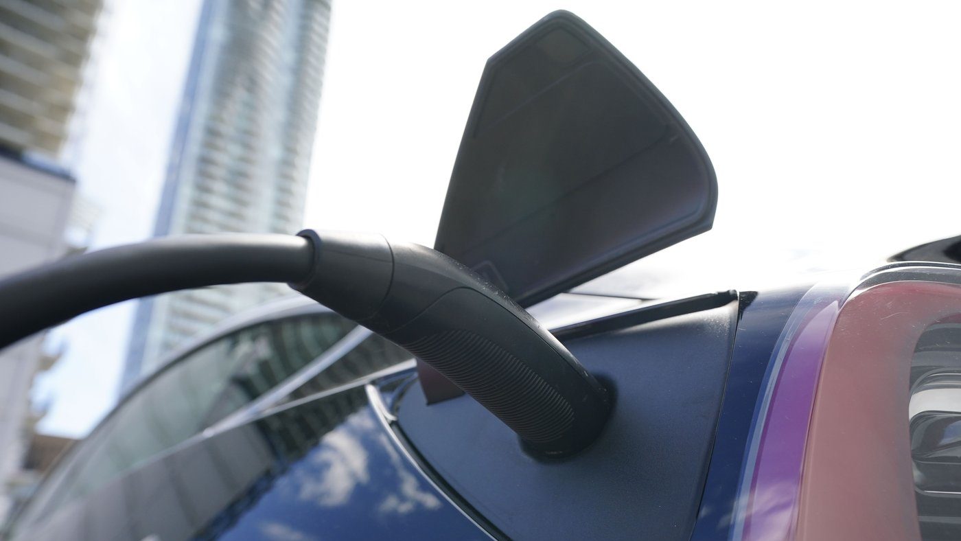 An electric vehicle is charged in Ottawa on July 13, 2022