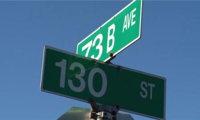 Street signs at the corner of 73 B Avenue and 130 Street