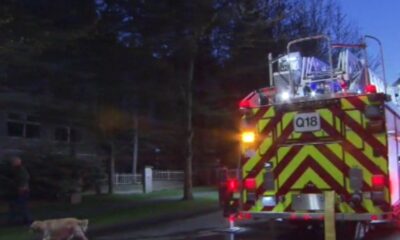 A fire engine is visible at the site of a fire in a condo building in Surrey on April 25, 2025.