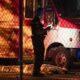 A victim lies near a food truck after a car drove into a crowd at the Lapu Lapu Festival in Vancouver on Saturday April 26, 2025. THE CANADIAN PRESS/Rich Lam